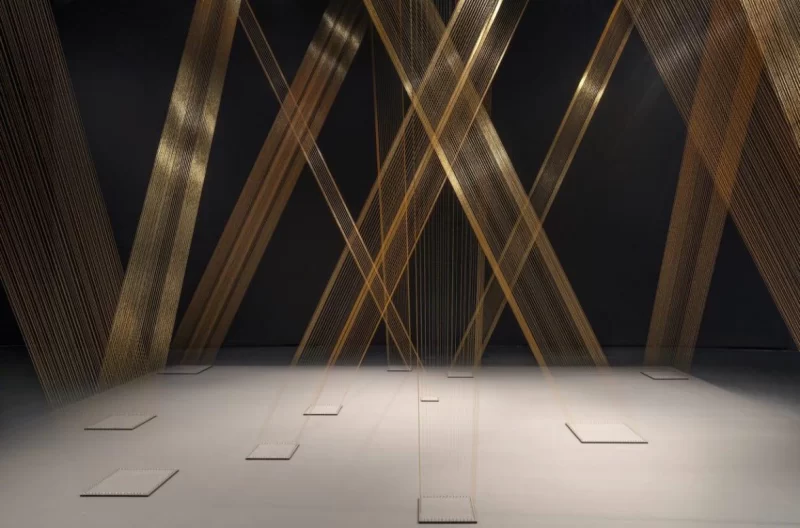 Lygia Pape, Ttéia 1, C, 2003/2025, golden thread, wood, nails and light, dimensionsvariable. Courtesy Pinault Collection, Paris. © Projeto Lygia Pape